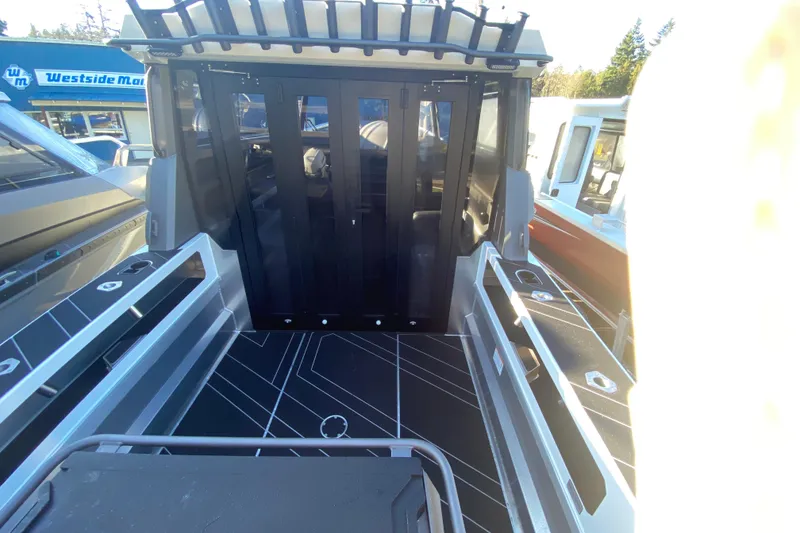 Slide: The Image of 2026 Stabicraft 2350 ULTRACAB WT SPORTFISH boat deck with sleek design and modern features. - 5