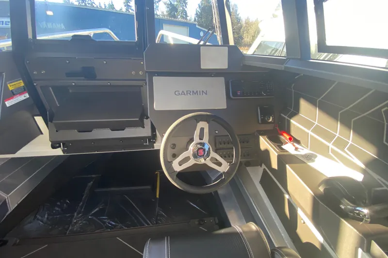 Slide: The Image of Interior of 2026 Stabicraft 2350 ULTRACAB WT SPORTFISH with Garmin navigation system. - 7