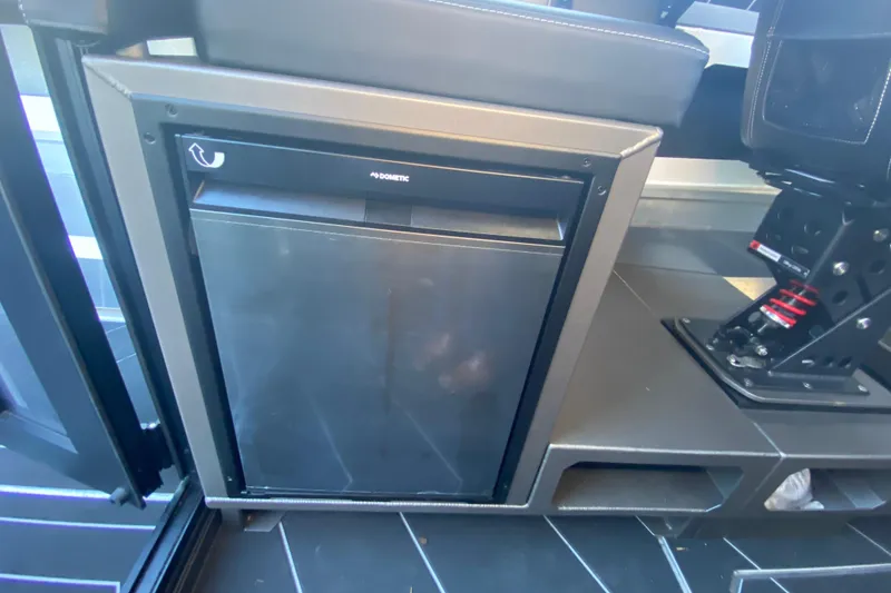 Slide: The Image of 2026 Stabicraft 2350 ULTRACAB WT SPORTFISH interior with Dometic fridge. - 9