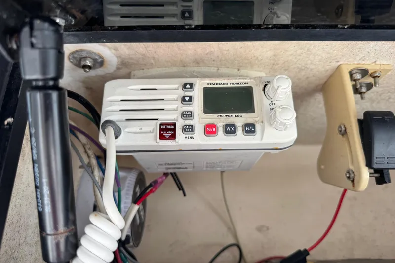 Slide: The Image of Standard Horizon Eclipse DSC radio on a 2006 May-Craft 2000CC boat dashboard. - 12