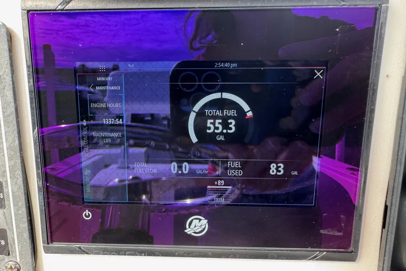 Slide: The Image of Display screen showing fuel data on a 2006 May-Craft 2000CC boat. - 8