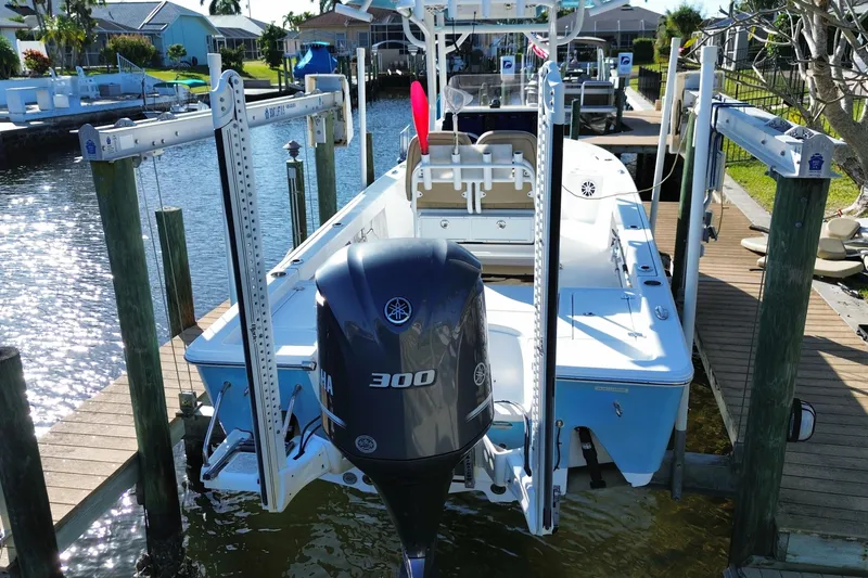 Slide: The Image of 2018 Sportsman Masters 247 Bay Boat docked with Yamaha 300 engine. - 12