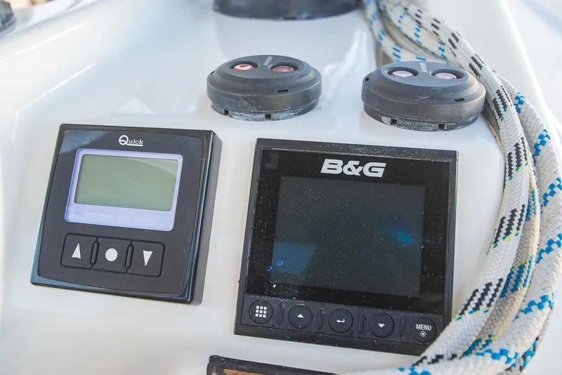 Slide: The Image of Bavaria C45 2021 yacht control panel with navigation instruments and ropes. - 17