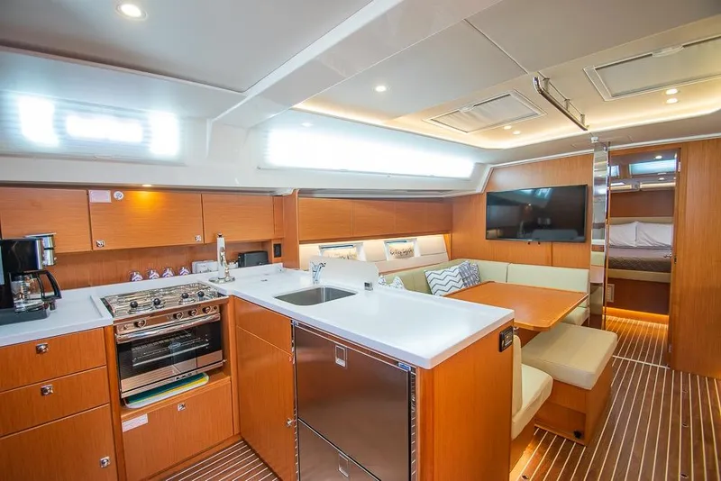 Slide: The Image of Luxurious interior of 2021 Bavaria C45 yacht with modern kitchen and cozy seating area. - 37