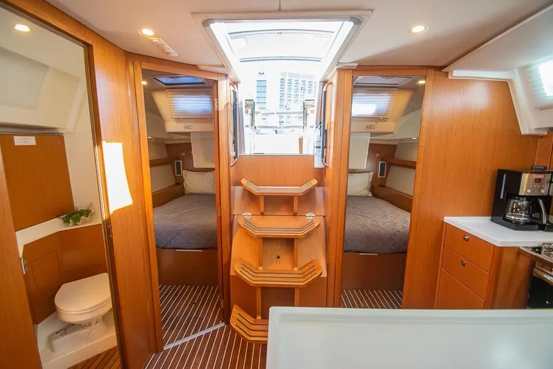 Slide: The Image of Interior of 2021 Bavaria C45 yacht featuring cozy cabins and modern amenities. - 60