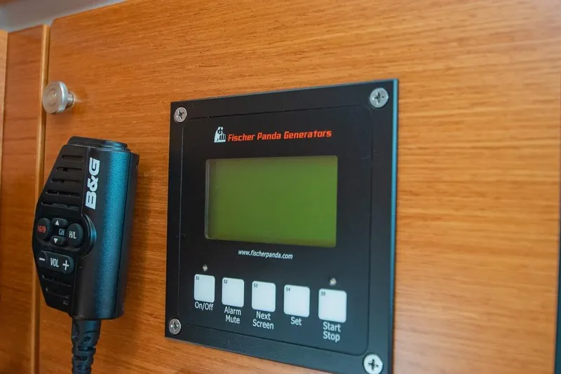 Slide: The Image of Control panel and radio on Bavaria C45 yacht, 2021 model. - 65