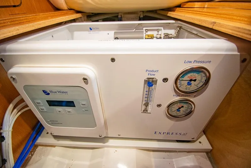 Slide: The Image of BlueWater desalination system in 2021 Bavaria C45 yacht, featuring pressure gauges and control panel. - 89