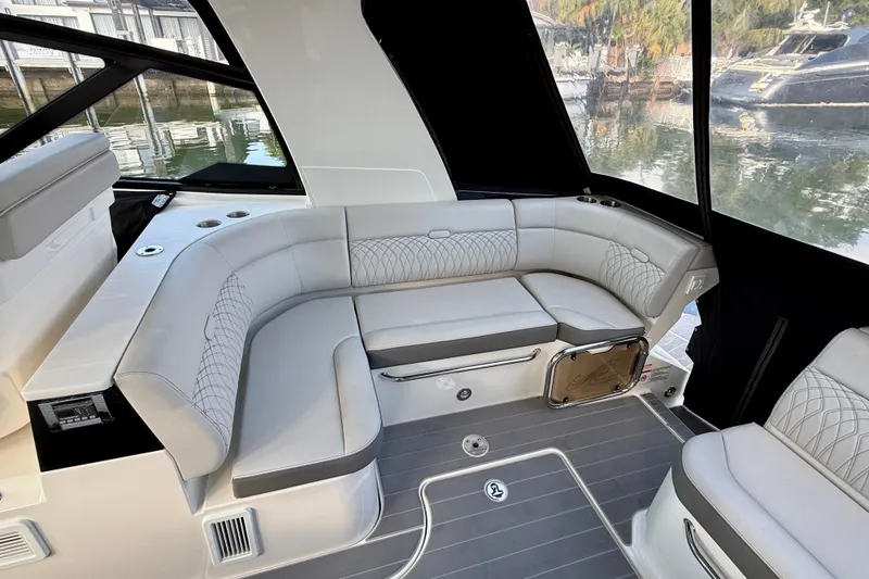 Slide: The Image of 2022 Sea Ray Sundancer 370 Outboard interior with elegant seating and modern design. - 15