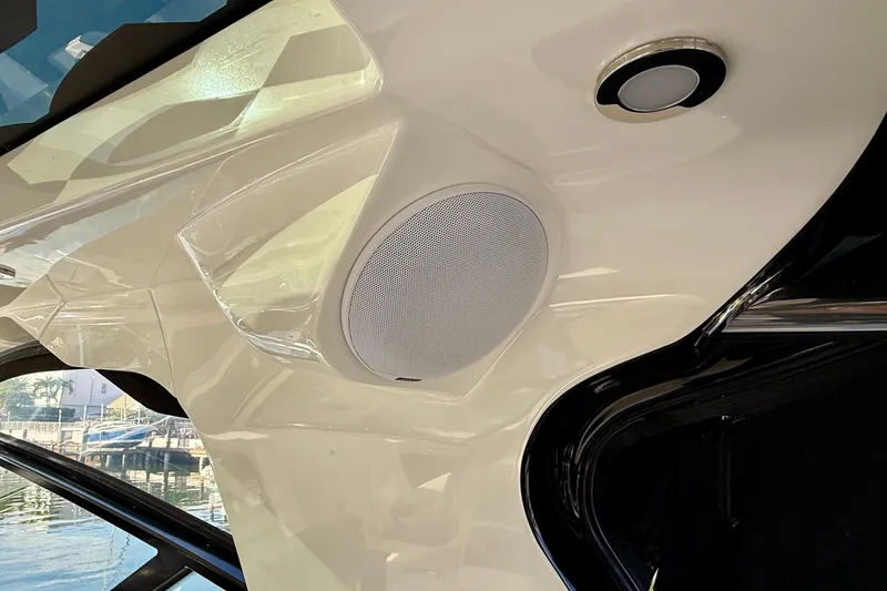 Slide: The Image of 2022 Sea Ray Sundancer 370 Outboard interior with speaker and light detail. - 30