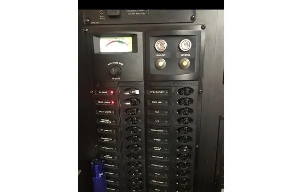 Slide: The Image of Electrical panel of 2005 Meridian 368 Motoryacht with switches and gauges. - 16