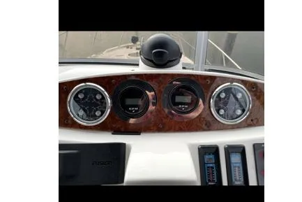 Slide: The Image of Dashboard of a 2005 Meridian 368 Motoryacht with gauges and controls. - 21