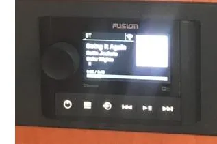 Slide: The Image of Fusion stereo system on 2005 Meridian 368 Motoryacht displaying song information. - 24