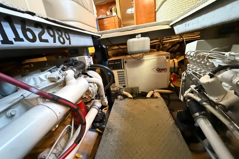 Slide: The Image of Engine room of 2005 Meridian 368 Motoryacht with visible machinery and equipment. - 34