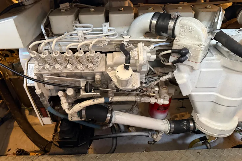 Slide: The Image of Engine of 2005 Meridian 368 Motoryacht, showcasing intricate mechanical components and piping. - 36