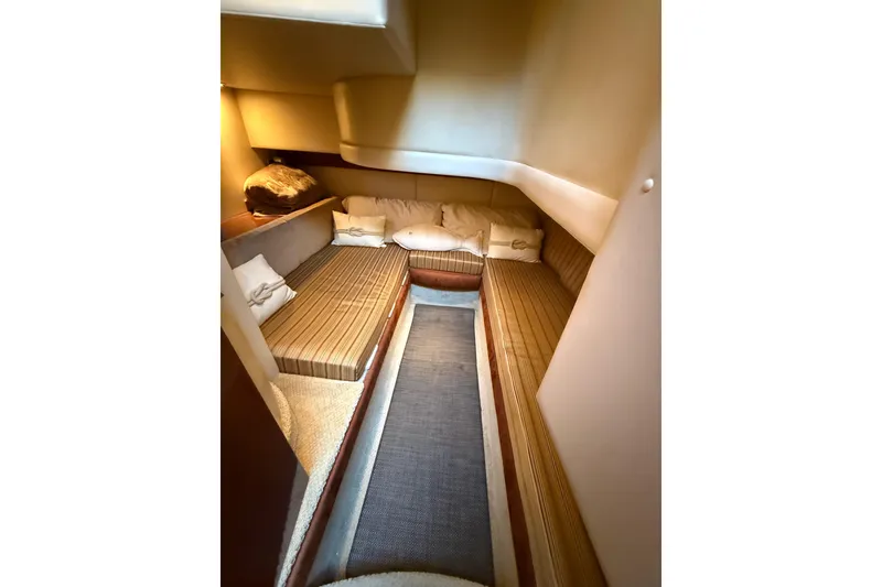 Slide: The Image of Interior cabin of 2007 Meridian 341 Sedan yacht with cozy seating and cushions. - 12