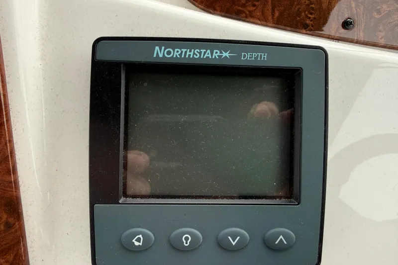 Slide: The Image of Northstar depth gauge on 2007 Meridian 341 Sedan boat dashboard. - 18