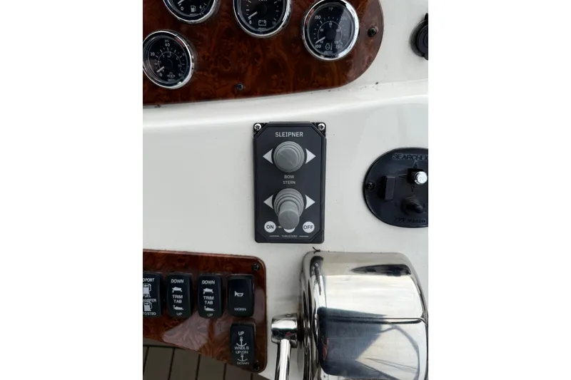 Slide: The Image of Control panel of a 2007 Meridian 341 Sedan boat with gauges and switches. - 20