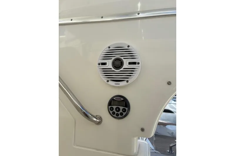 Slide: The Image of 2004 Silverton 48 Convertible yacht docked under clear blue sky. - 18