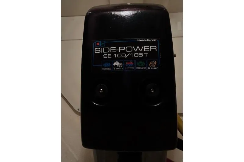 Slide: The Image of Open hatch on 2004 Silverton 48 Convertible yacht, revealing interior compartment. - 26