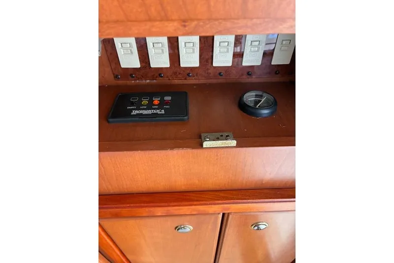 Slide: The Image of Engine room of 2004 Silverton 48 Convertible yacht with tools and equipment. - 28