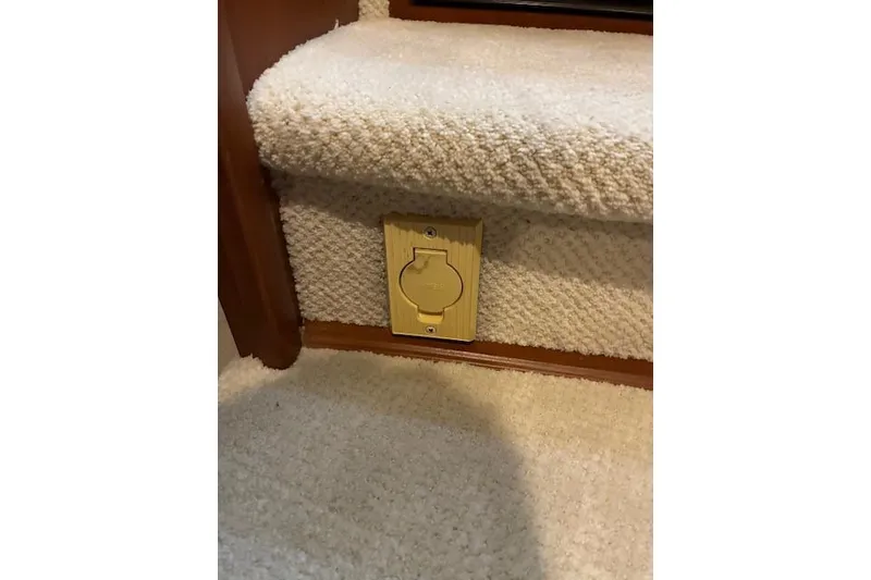 Slide: The Image of Engine room of a 2004 Silverton 48 Convertible yacht, showcasing detailed machinery. - 29