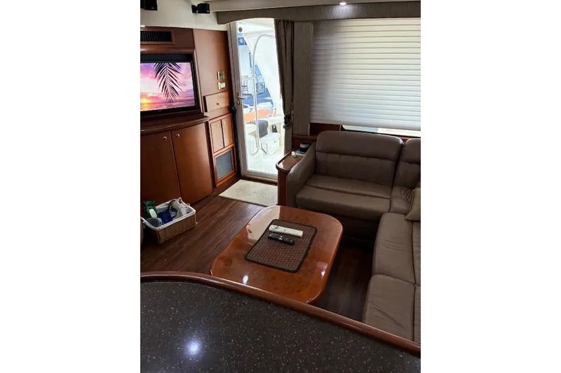 Slide: The Image of Algae-X magnetic fuel conditioner on 2004 Silverton 48 Convertible boat. - 32