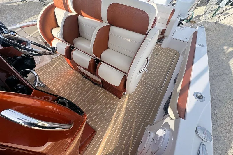 Slide: The Image of 2016 Nor-Tech 340 Sport Center Console with luxurious seating and sleek design. - 20