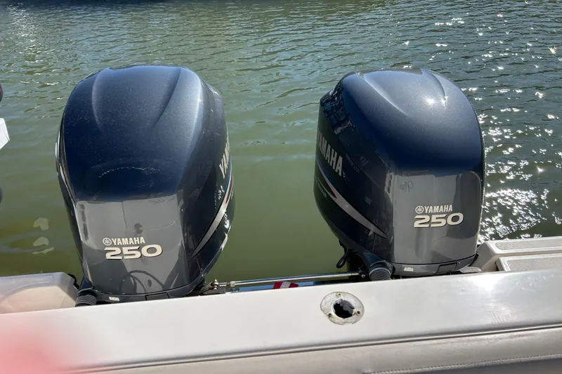 Slide: The Image of Twin Yamaha 250 outboard engines on a 2008 Pursuit OS 315 Offshore boat. - 25