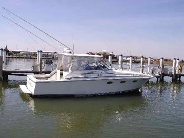Slide: The Image of Trojan Express 10 Meter with Custom Hardtop Enclosure 1988 - 1