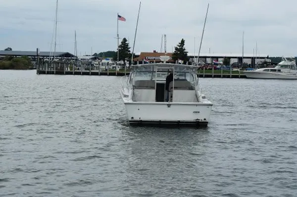 Slide: The Image of Trojan Express 10 Meter with Custom Hardtop Enclosure 1988 - 10