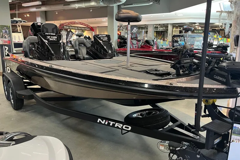 The Image of 2026 Nitro Z19 XL Pro boat displayed indoors with Garmin equipment. - 0