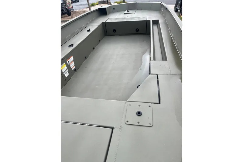 Slide: The Image of 2026 Tracker Grizzly 1756 T Marsh boat interior, showcasing spacious and durable design. - 2