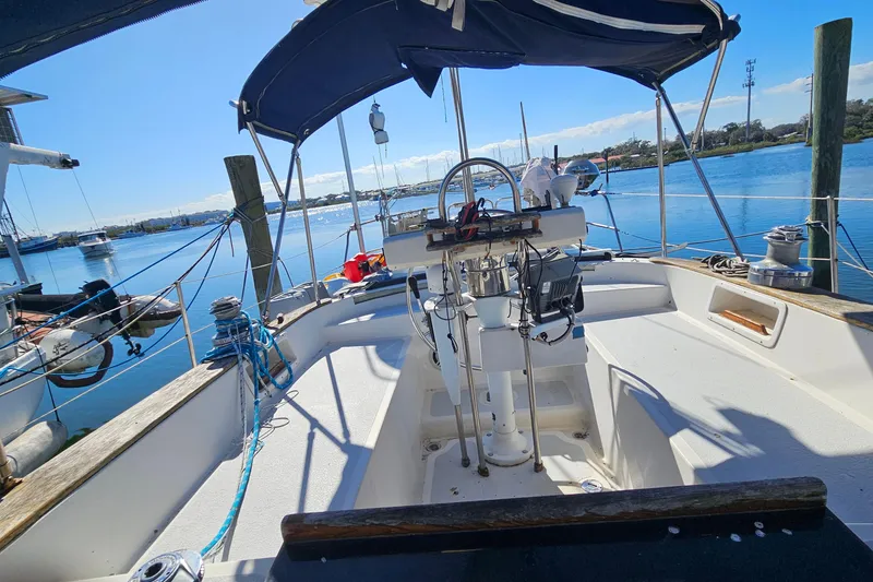 Slide: The Image of Sailboat cockpit view, ENDEAVOR 42, 1989 model, docked in a sunny marina. - 23