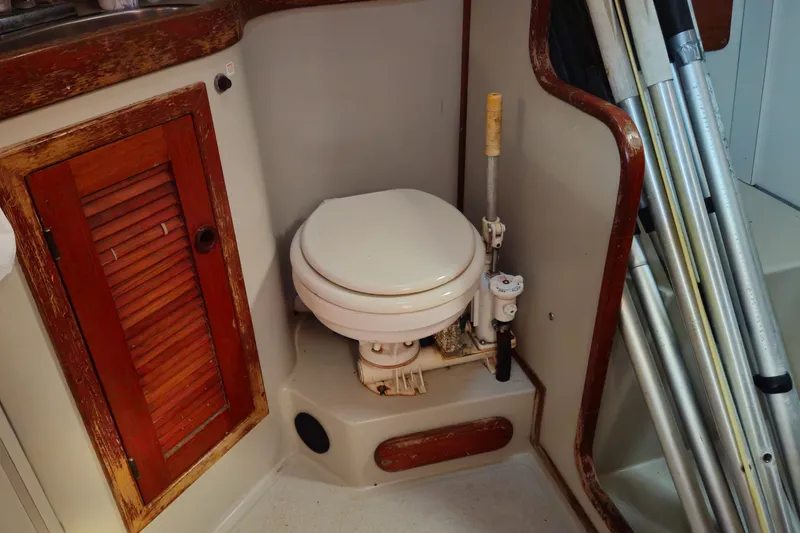 Slide: The Image of Compact marine toilet in 1989 ENDEAVOR 42 sailboat bathroom. - 57