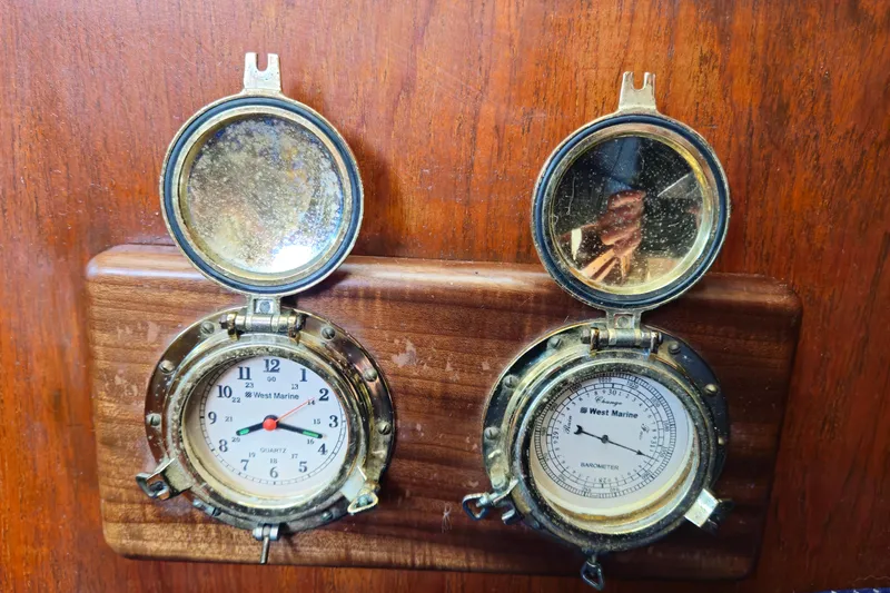 Slide: The Image of Vintage West Marine clock and barometer on Endeavor 42 yacht, 1989 model. - 64