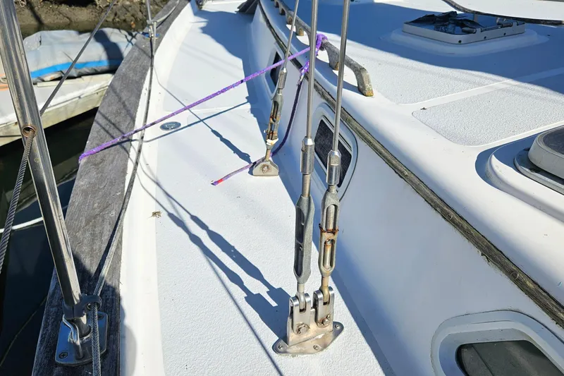 Slide: The Image of Deck of 1989 ENDEAVOR 42 sailboat with rigging and hardware details. - 66