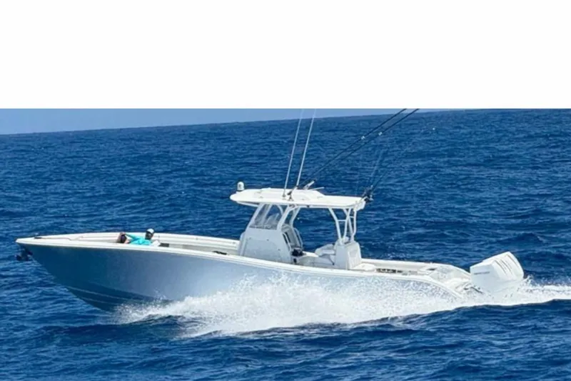 Slide: The Image of 2023 Yellowfin 36 Offshore boat cruising on open ocean waters. - 20