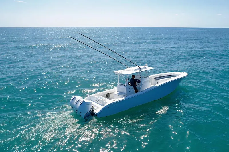 Slide: The Image of 2023 Yellowfin 36 Offshore boat cruising on open ocean waters. - 3