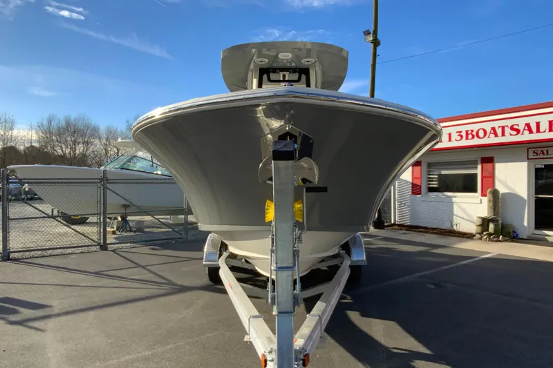 Slide: The Image of 2026 Cobia 245 Center Console boat on trailer at dealership. - 4