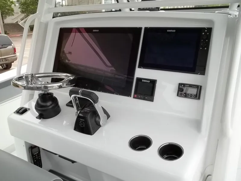 Slide: The Image of 2018 Yellowfin 39 Offshore helm with Simrad displays. - 10