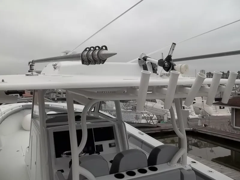 Slide: The Image of 2018 Yellowfin 39 Offshore boat with fishing rod holders. - 12