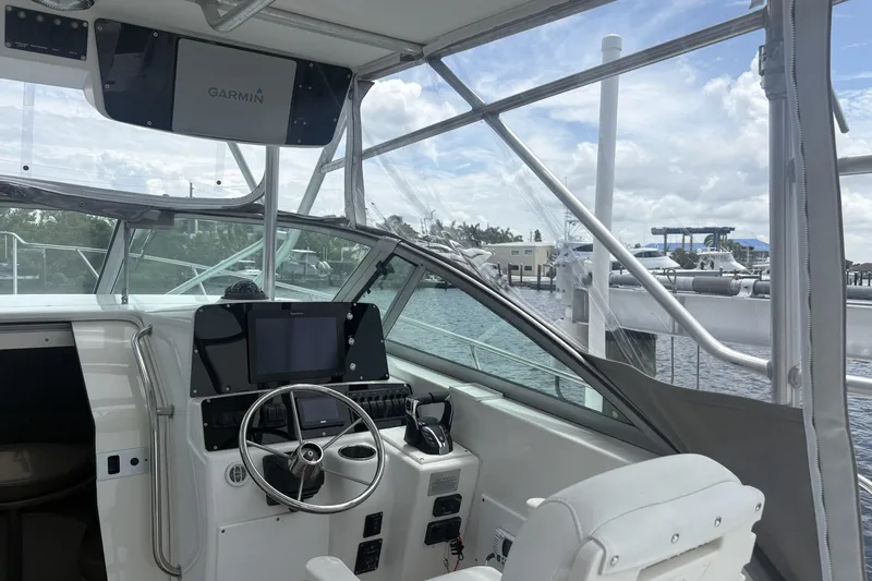 Slide: The Image of Interior view of 2001 Boston Whaler 285 Conquest boat with Garmin navigation system. - 14