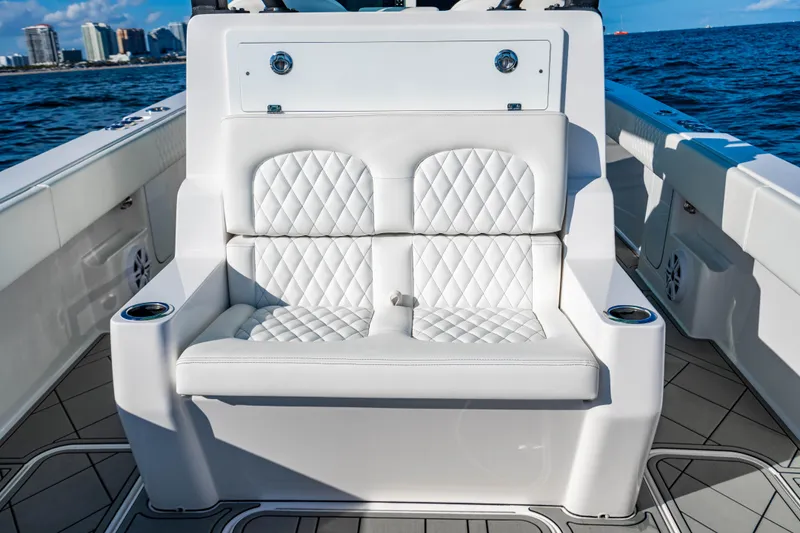 Slide: The Image of Luxurious seating on 2026 Reef Runner 340 boat with ocean view. - 10