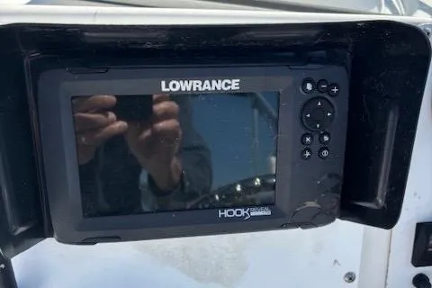 Slide: The Image of Lowrance Hook fish finder on 2001 Sea Pro 190 Dual Console boat dashboard. - 7