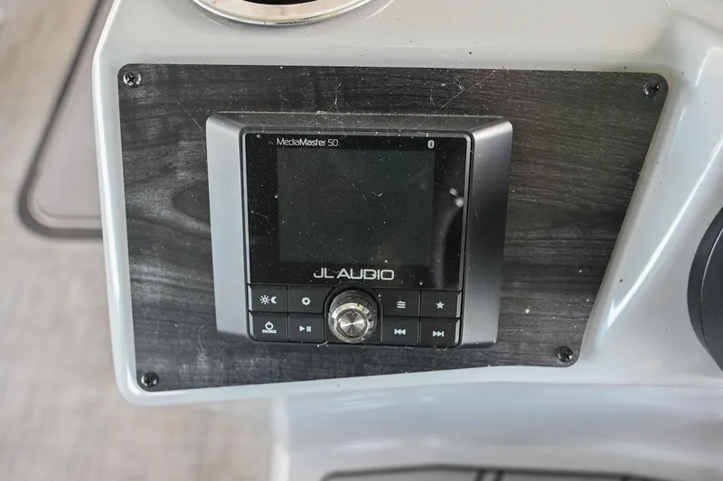 Slide: The Image of JL Audio MediaMaster 50 on 2021 Harris Sunliner 230 boat dashboard. - 31
