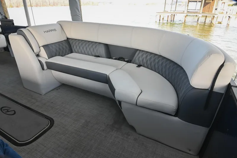 Slide: The Image of Luxurious seating on 2021 Harris Sunliner 230 pontoon boat, featuring elegant upholstery and spacious design. - 35