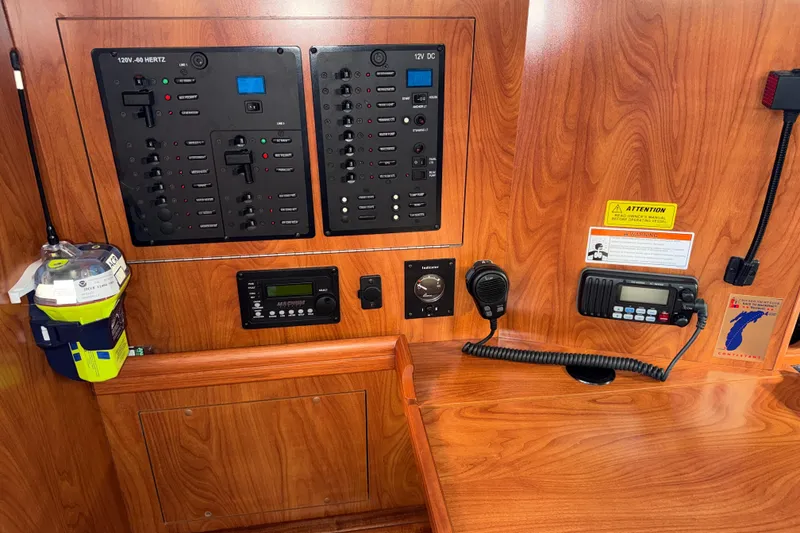 Slide: The Image of Control panel of a 2011 Hunter 39 sailboat with communication and navigation equipment. - 20