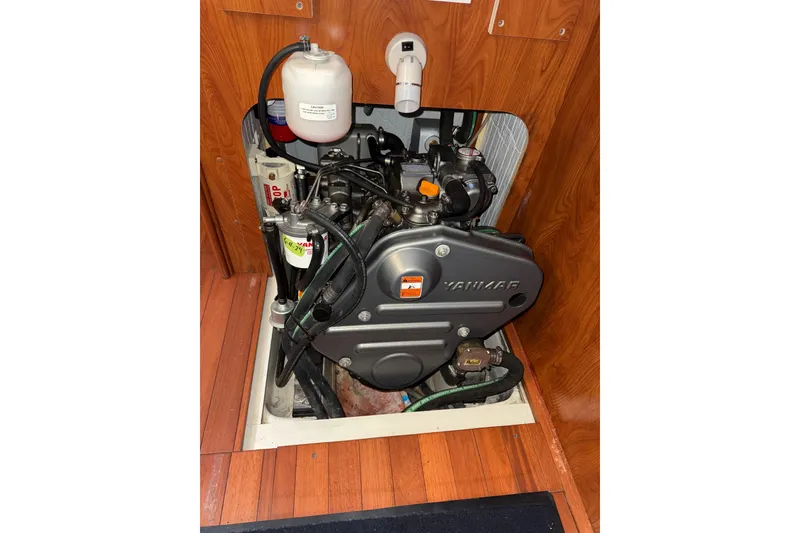 Slide: The Image of Engine compartment of a 2011 Hunter 39 sailboat with Yanmar engine. - 32