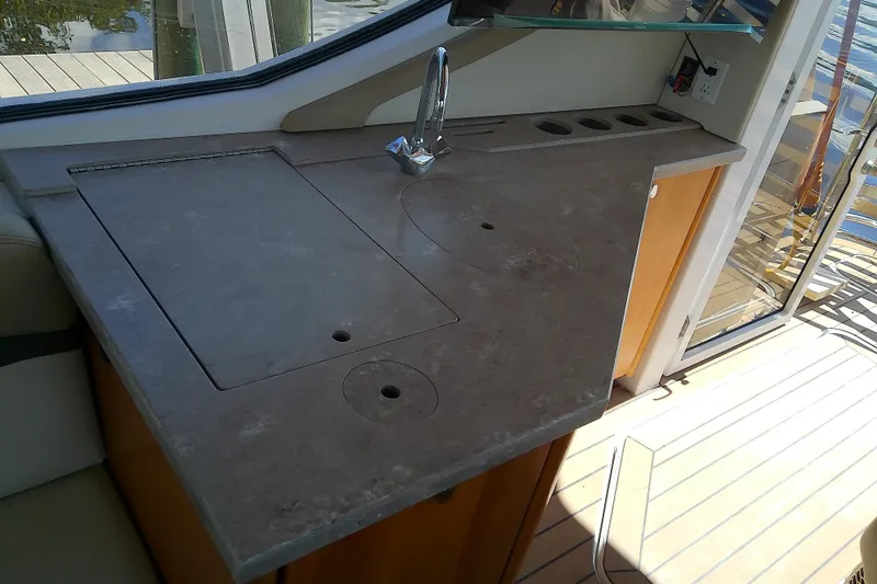 Slide: The Image of 2019 Floe Craft 3950C Aquafina boat interior with sleek countertop and modern faucet. - 22