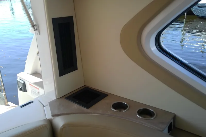 Slide: The Image of Interior of 2019 Floe Craft 3950C Aquafina boat with window and cup holders. - 27